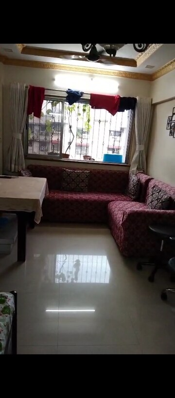 Living Room in 1 BHK Apartment at New Swapnapurti CHS, Malad East – for Rent