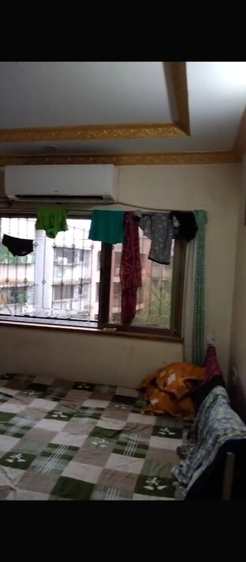 Bedroom in 1 BHK Apartment at New Swapnapurti CHS, Malad East – for Rent