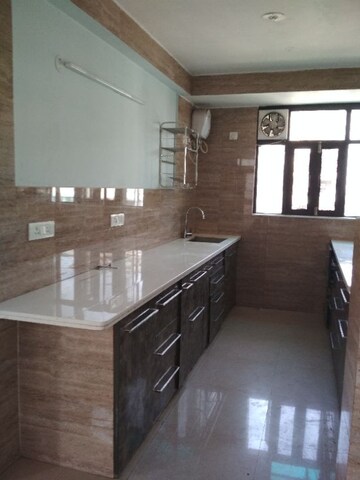 Kitchen in 4 BHK Apartment at Orchid Valley Apartment, Sector 19 Dwarka – for Rent