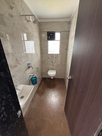 Bathroom in 1 BHK Apartment at Rahul Atul Nagar CHS, Warje – for Rent