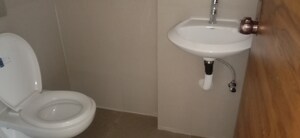 Bathroom in 3 BHK Apartment at Je And Vee Om Trimurti, Malad East – for Sale