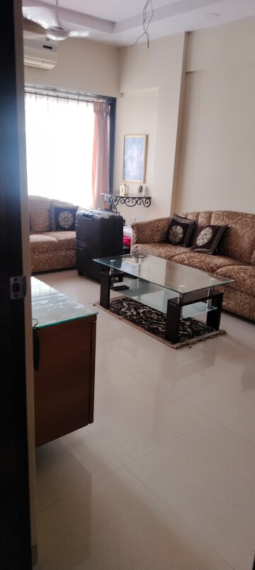 Living Room in 1 BHK Apartment at Greenfields CHS, Andheri West – for Rent