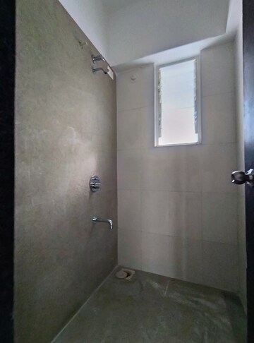 Bathroom in 1.5 BHK Apartment at Mantra Insignia, Mundhwa – for Rent