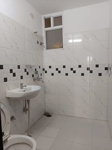 Bathroom in 4 BHK Apartment at Green Valley Heights, Dhakoli – for Rent