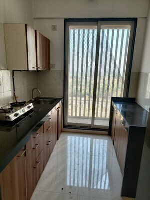 Kitchen in 1 BHK Apartment at Bhairaav Goldcrest Residency, Ghansoli – for Sale