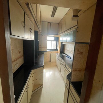Kitchen in 2 BHK Apartment at Avinash Apartments, Seven Bunglow – for Rent