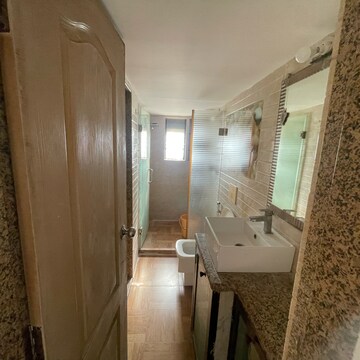 Bathroom in 2 BHK Apartment at Avinash Apartments, Seven Bunglow – for Rent