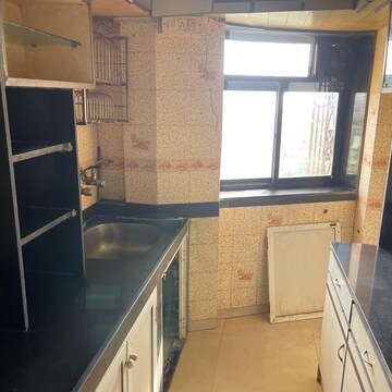 Kitchen in 2 BHK Apartment at Avinash Apartments, Seven Bunglow – for Rent