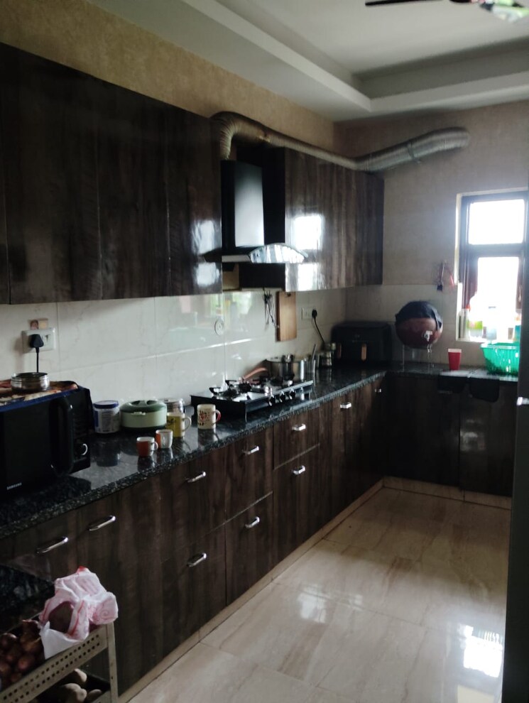 Kitchen, green fields colony 4 Bedroom 210 Sq.Yd. Builder Floor In Green Fields Colony Faridabad 9102459