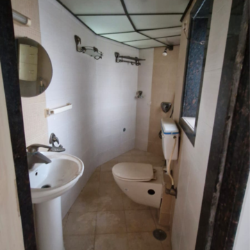 Bathroom in 1 BHK Apartment at Gold Crown, Seven Bunglow – for Sale