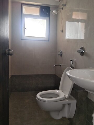 Bathroom in 2 BHK Apartment at Urban Skyline Phase 1, Ravet – for Rent