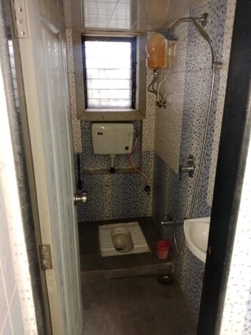 Bathroom in 1 BHK Apartment at Shreeji Tower, Panchsheel Nagar – for Rent