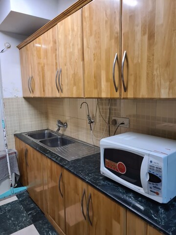 Kitchen in 4 BHK Apartment at DLF Westend Heights, Sector 53 – for Rent