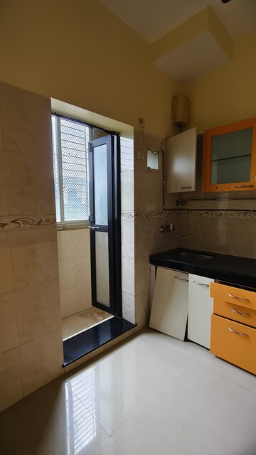 Kitchen in 1 BHK Apartment at K Raheja Heights, Malad East – for Rent