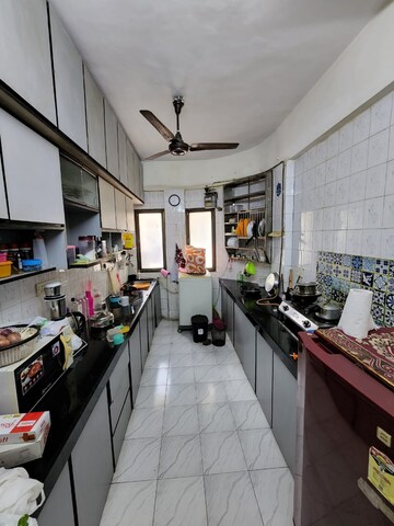 Kitchen in 2 BHK Apartment at Aayush Gulmohar, Chembur – for Rent