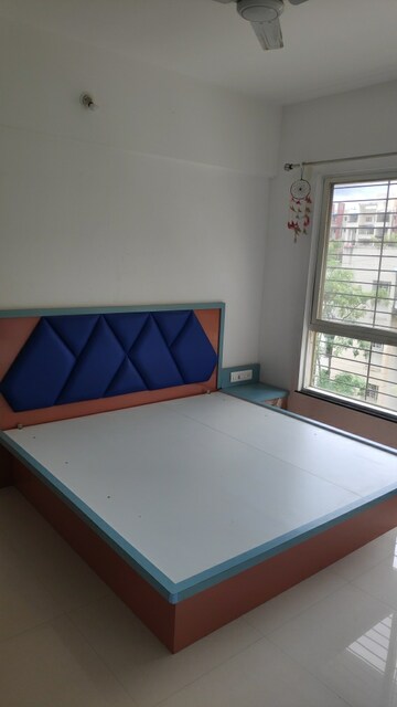 Bedroom in 2 BHK Apartment at Punyadham Society, Wadgaon Sheri – for Rent