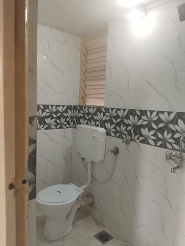 Bathroom in 2 BHK Apartment at Pushpak Nagar – for Rent