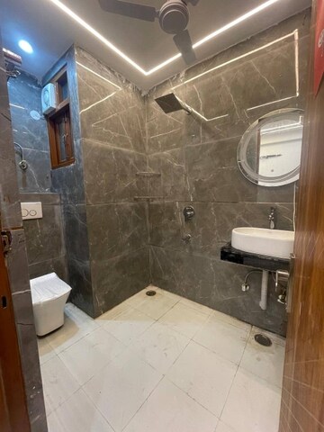 Bathroom in 1 BHK Apartment at Freedom Fighters Enclave – for Rent