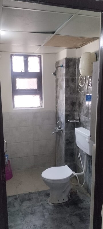Bathroom in 1 BHK Apartment at Auric City Homes, Sector 82 – for Rent