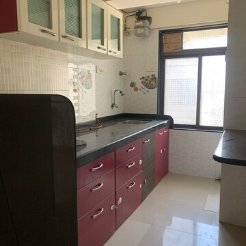 Kitchen in 2 BHK Apartment at Krishna Classic, Babhai Naka – for Rent