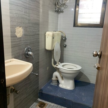 Bathroom in 2 BHK Apartment at Krishna Classic, Babhai Naka – for Rent