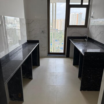 Kitchen in 2 BHK Apartment at Naman Habitat, Dhakoji Sethpada – for Sale