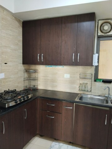 Kitchen in 3 BHK Apartment at Unitech Uniworld Gardens 2, Sector 47 – for Rent