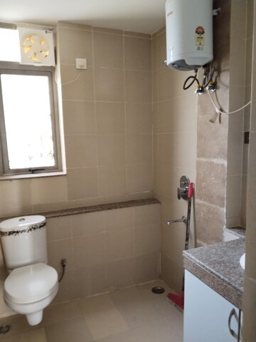 Bathroom in 2 BHK Apartment at Unitech Uniworld Gardens 2, Sector 47 – for Rent