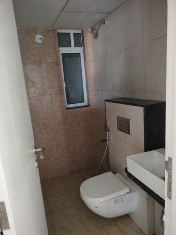 Bathroom in 3 BHK Apartment at Godrej Green Vistas, Mahalunge – for Rent