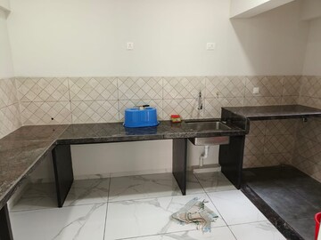 Kitchen in 3 BHK Apartment at Rahul Downtown, Punawale – for Rent