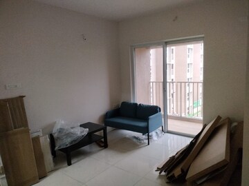 Living Room in 1 BHK Apartment at Godrej Green Vistas, Mahalunge – for Rent