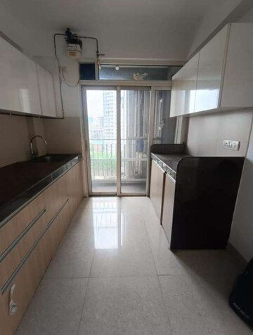 Kitchen in 3 BHK Apartment at The Wadhwa Platina, Kolshet Road – for Rent