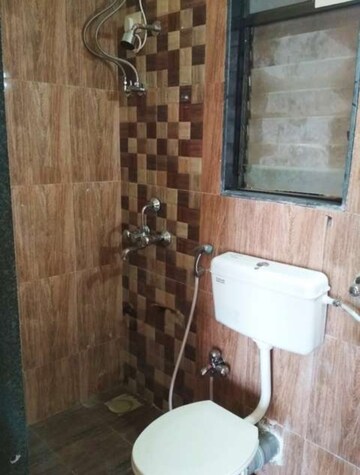Bathroom in 2 BHK Apartment at Hubtown Greenwoods, Vartak Nagar – for Rent
