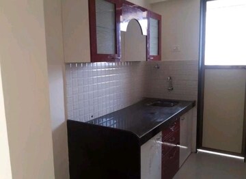 Kitchen in 1 BHK Apartment at VR Bhoomi Acre I Wing, Waghbil – for Rent