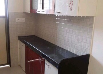 Kitchen in 1 BHK Apartment at VR Bhoomi Acre I Wing, Waghbil – for Rent