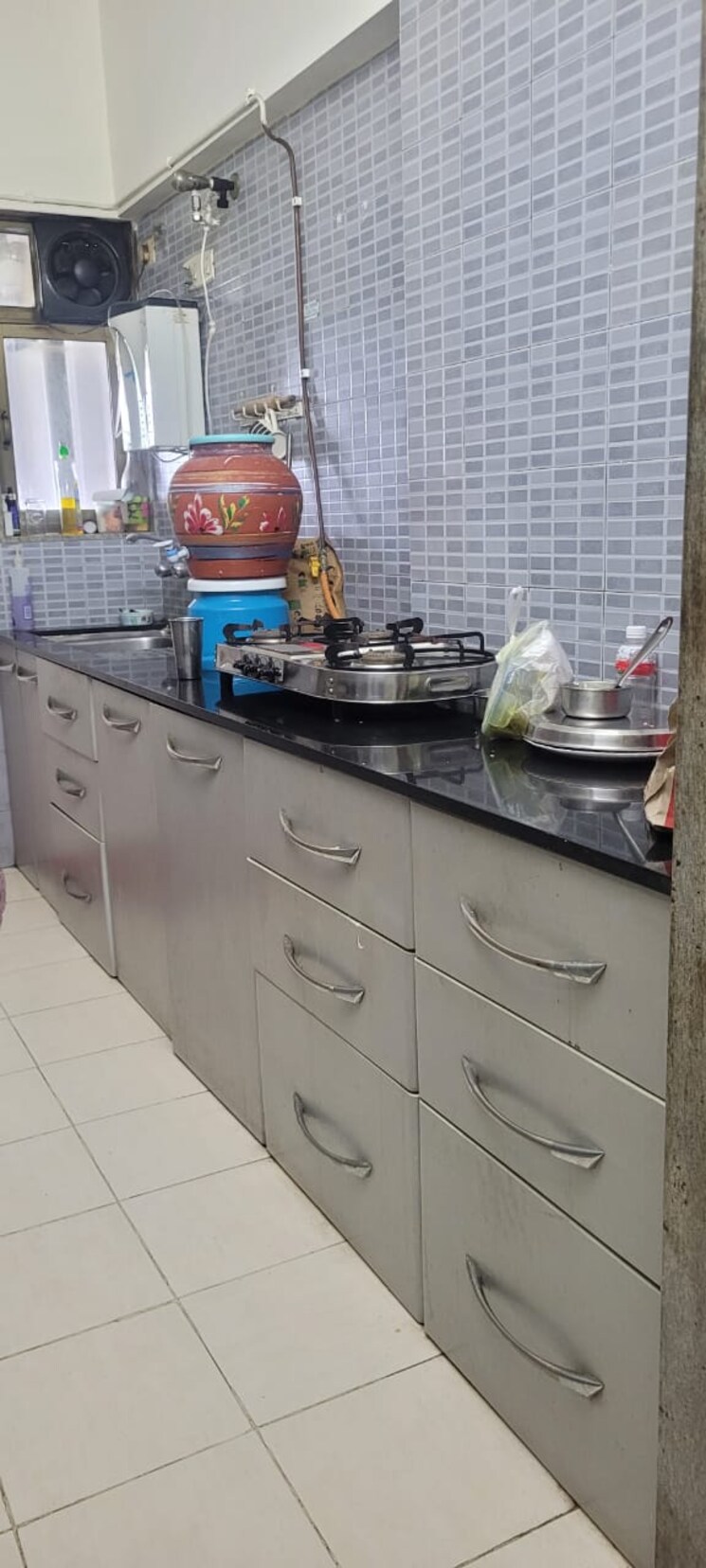 Kitchen, nri-complex-phase-2 2.5 Bedroom 1350 Sq.Ft. Apartment In Seawoods Navi Mumbai 9103228