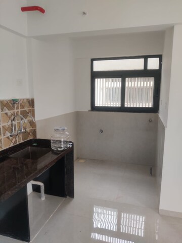 Kitchen in 3 BHK Apartment at Urban Skyline Phase 1, Ravet – for Rent