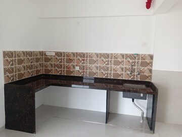 Kitchen in 3 BHK Apartment at Urban Skyline Phase 1, Ravet – for Rent