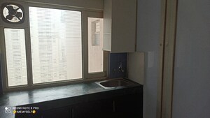 Kitchen in 2 BHK Apartment at ROF Aalayas, Sector 102 – for Sale