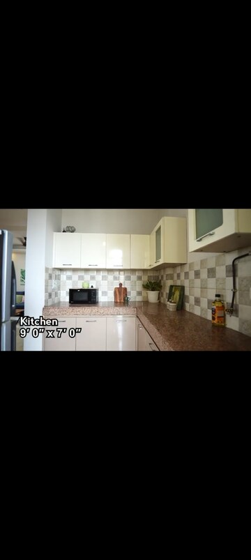 Kitchen in 3 BHK Apartment at AFOWO Raksha Addela, Sector 16c Greater Noida – for Sale