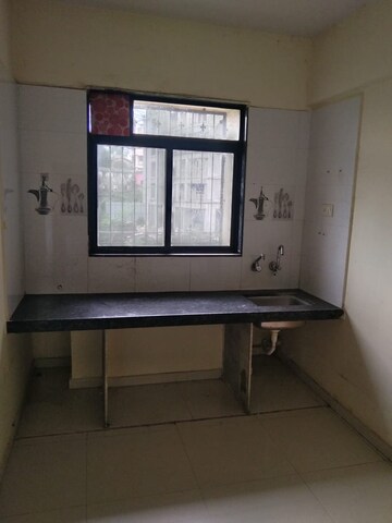 Kitchen in 1 BHK Apartment at Raj Tulsi City, Badlapur East – for Rent