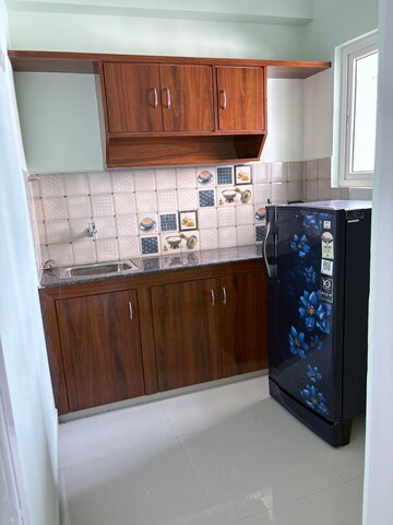 Kitchen in 2 BHK Apartment at Mahalakshmi Plaza, Madhapur – for Rent