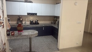 Kitchen in 3 BHK Apartment at Raheja Vedaanta, Sector 108 – for Sale