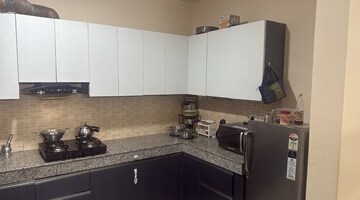 Kitchen in 3 BHK Apartment at Raheja Vedaanta, Sector 108 – for Sale
