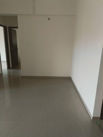 Room in 2 BHK Apartment at Dheeraj Jade Residences, Wagholi – for Rent