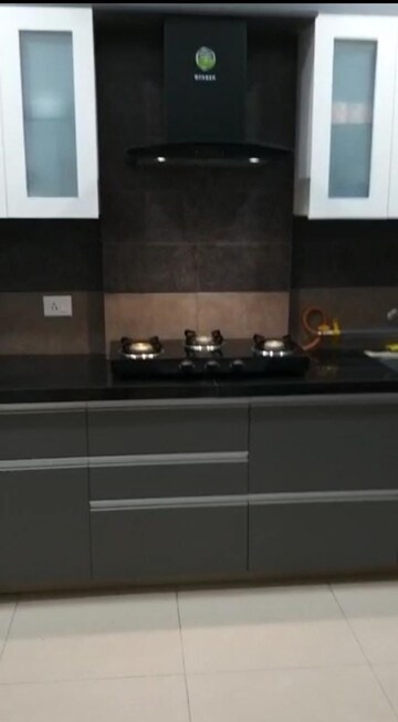 Kitchen in 3 BHK Apartment at HN Safal Orchid Harmony, Shela – for Rent