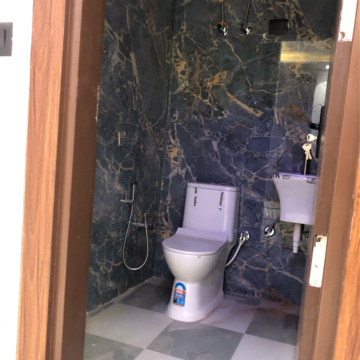 Bathroom in 2 BHK Apartment at Palm Residency Chhatarpur, Rajpur Khurd Extension – for Rent