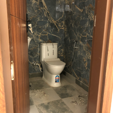 Bathroom in 2 BHK Apartment at Palm Residency Chhatarpur, Rajpur Khurd Extension – for Rent