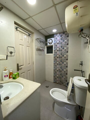 Bathroom in 3 BHK Apartment at Supertech Cape Town, Sector 74 – for Rent