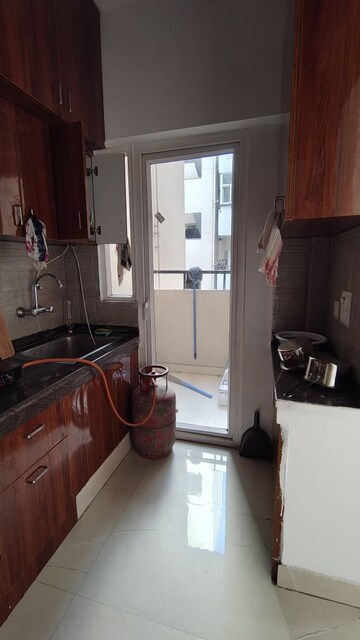 Kitchen in 2 BHK Apartment at Ace Divino, Sector 1 Greater Noida – for Rent